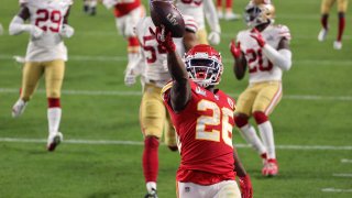 Damien Williams (26) of the Kansas City Chiefs runs for a touchdown against the San Francisco 49ers during the fourth quarter in Super Bowl LIV at Hard Rock Stadium on Feb. 2, 2020, in Miami, Florida.