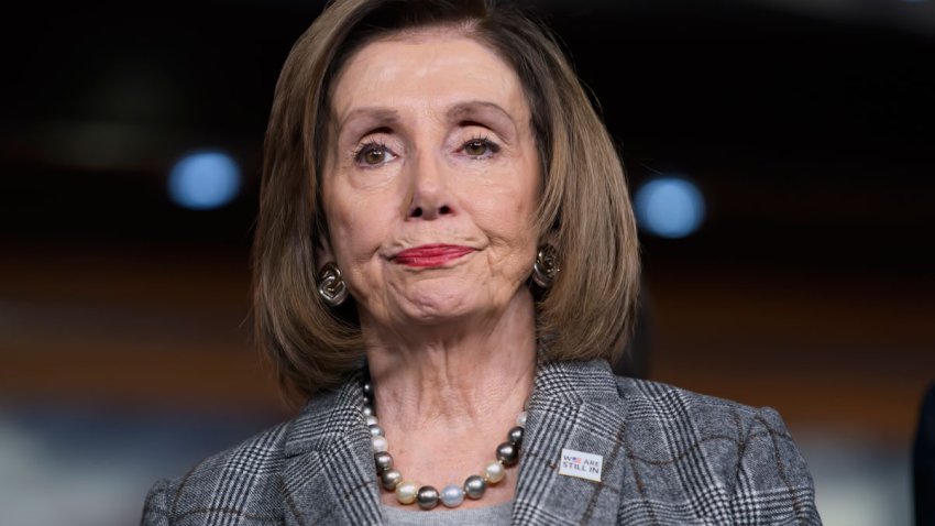 Speaker of the House Nancy Pelosi, D-Calif., stands during a news conference on climate change at the Capitol in Washington, Friday, Dec. 6, 2019.