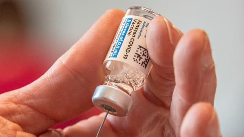 Athens City-County Health Department Director of Nursing, Crystal Jones, 52, loads syringes with the vaccine on the first day of the Johnson and Johnson vaccine.