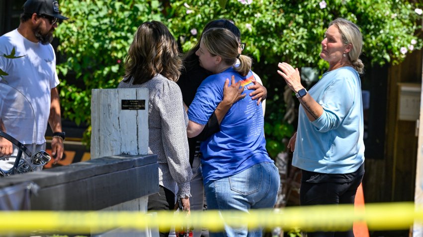 Trabuco Canyon, CA – August 25: People greet each other at Cook’s Corner two days after a mass shooting at the bar in Trabuco Canyon, CA, on Friday, August 25, 2023. John Snowling injured his estranged wife, Marie Snowling, but killed three other people in the mass shooting. (Photo by Jeff Gritchen/MediaNews Group/Orange County Register via Getty Images)