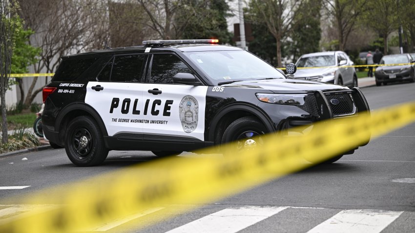 WASHINGTON DC, US – APRIL 07: Police officers cordon off the scene after a body found shot near George Washington University Hospital in Washington DC, United States on April 07, 2023. (Photo by Celal Gunes/Anadolu Agency via Getty Images)