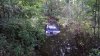 Conductor de DoorDash culpa al GPS luego que su auto quedara sumergido en un pantano