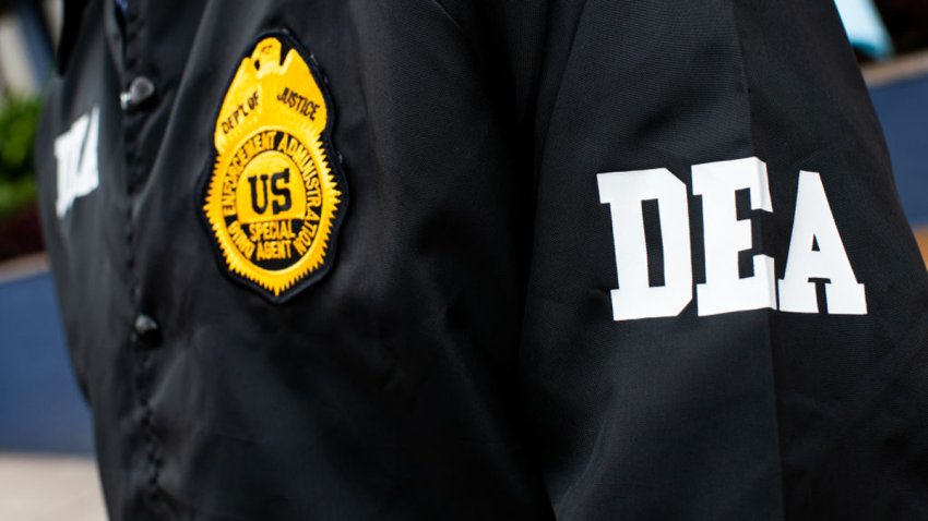 A member of the United States Drug Enforcement Administration (DEA) poses for an ilustrative photo during a press conference between the Colombian Judicial Police (DIJIN), the Ministry of Defense and representatives of U.S. government agencies; DEA, FBI and Homeland Security (HSI) in Bogota, Colombia, March 29, 2023. (Photo by Sebastian Barros/NurPhoto via Getty Images)