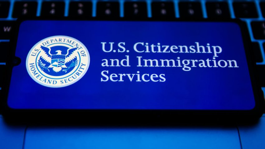 U.S. Citizenship and Immigration Services seal is displayed on a mobile phone screen for illustration photo. Krakow, Poland on February 2nd, 2023.  (Photo by Beata Zawrzel/NurPhoto via Getty Images)