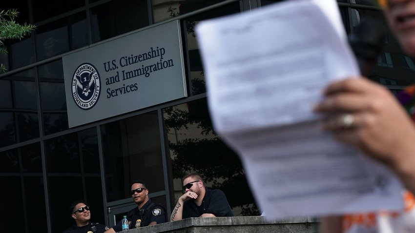 FAIRFAX, VA – JULY 05:  An activist speaks during a protest outside a U.S. Citizenship and Immigration Services field office July 5, 2018 in Fairfax, Virginia. The group No Justice No Pride staged a protest to urge to abolish the Immigration and Customs Enforcement (ICE).  (Photo by Alex Wong/Getty Images)