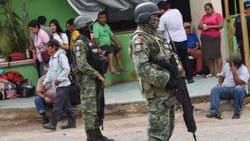 11 June 2024, Mexico, Yajalon: Soldiers are deployed at an emergency shelter for evacuated villagers. Due to a violent conflict in a community in southern Mexico, more than 4,000 villagers have been evacuated by soldiers and taken to two emergency shelters. Photo: Isaac Guzman/dpa (Photo by Isaac Guzman/picture alliance via Getty Images)