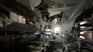 Se informó que el incendio se había controlado, luego de que comenzara en la cocina y se propagara hasta el ático.