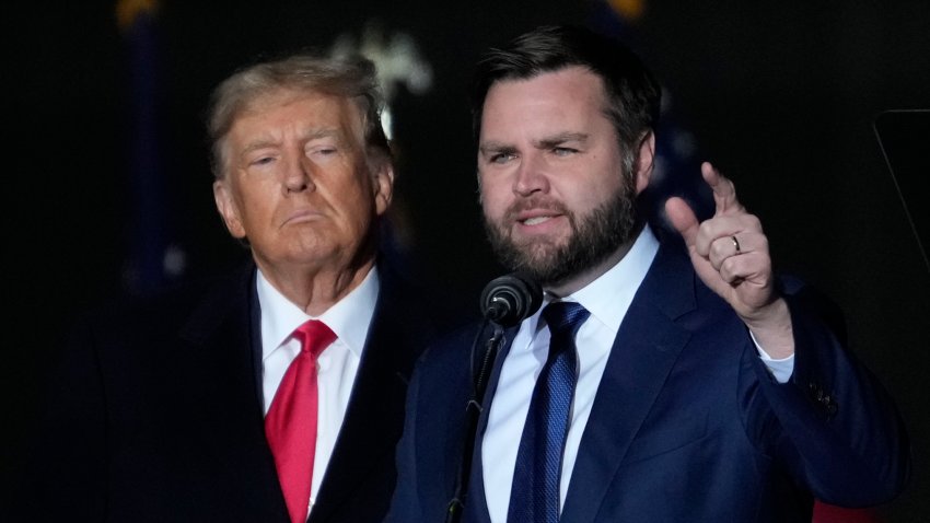 VANDALIA, OHIO – NOVEMBER 07: Former U.S. President Donald Trump and Republican candidate for U.S. Senate JD Vance greet supporters during the rally at the Dayton International Airport on November 7, 2022 in Vandalia, Ohio. Trump campaigned at the rally for Ohio Republican candidates including Republican candidate for U.S. Senate JD Vance, who is running in a tight race against Democratic candidate for U.S. Senate Rep. Tim Ryan (D-OH). (Photo by Drew Angerer/Getty Images)