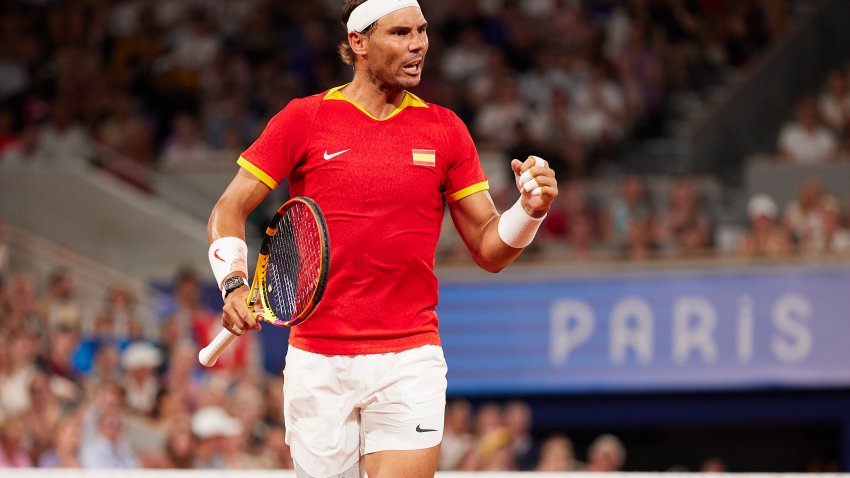 Rafael Nadal of Team Spain celebrates with partner (out of frame) Carlos Alcaraz of Team Spain against Austin Krajicek of Team United States and Rajeev Ram of Team United States during the Men's Doubles Quarter-final match on day five of the Olympic Games Paris 2024 at Roland Garros on July 31, 2024 in Paris, France.