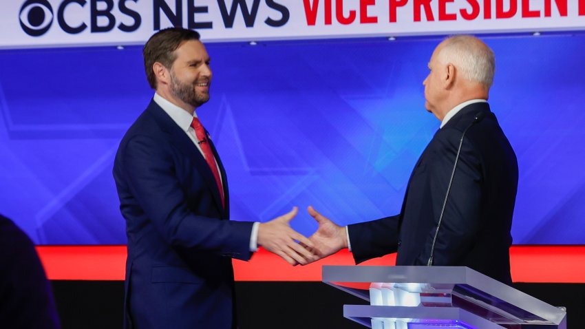 NEW YORK – OCTOBER 01:  Democratic vice presidential candidate Minnesota Gov. Tim Walz and  Republican vice presidential candidate Sen. JD Vance (R-OH) shake hands after a debate at the CBS Broadcast Center on October 1, 2024 in New York City. This is expected to be the only vice presidential debate of the 2024 general election. (Photo by Chip Somodevilla/Getty Images)