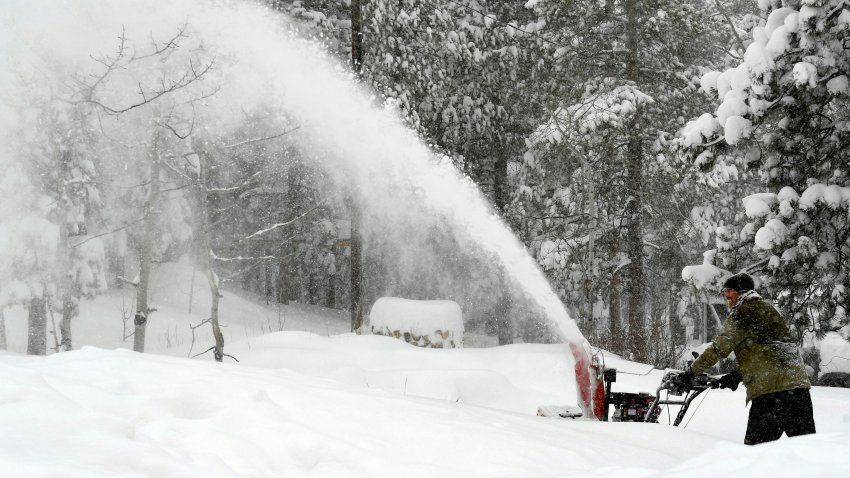 NEDERLAND, COLORADO – MARCH 14:  Nick Emery clears mountains of snow from his driveway  on March 14, 2021 in Nederland, Colorado. As of 3:51 p.m. MDT the National Weather Service reported 36 inches in Nederland. The National Weather Service said Sunday evening that 24.1 inches of snow have now been measured in this storm at Denver International Airport, where the official Denver snow records are tallied. That puts this storm as the¬†fourth-largest in Denver history, topping the 23.8 inches that fell in the Dec. 24, 1982 storm.  This storm is now the largest in Denver since the Dec. 20-21, 2006 storm, when 20.7 inches of snow were recorded. (Photo by Helen H. Richardson/MediaNews Group/The Denver Post via Getty Images)