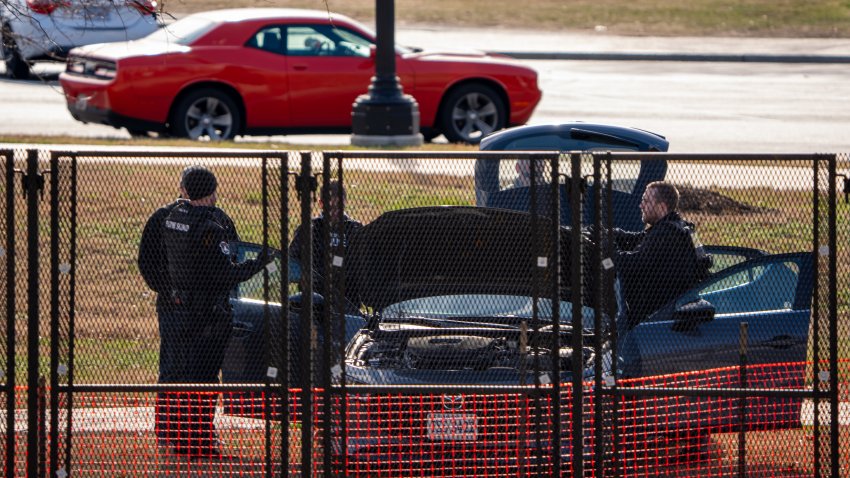 WASHINGTON, DC – JANUARY 2: U.S. Capitol Police search the car of a driver who was arrested after driving erratically and drove onto the grass near the Capitol Hill Reflecting Pool on January 2, 2025 in Washington, DC. Police are on high alert with major national special security events this month including the January 6th, 2025 vote count to certify the election, Inauguration Day, and a ceremony for former U.S. President Jimmy Carter who will lie in state in the U.S. Capitol’s rotunda. (Photo by Andrew Harnik/Getty Images)