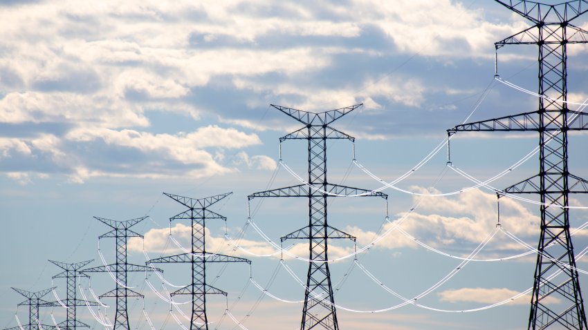 Electricity lines shining at sunset light.