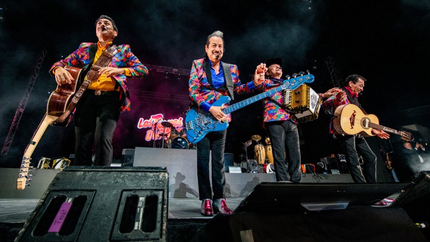 LOS ANGELES, CALIFORNIA – APRIL 02: (L-R) Luis Hernández, Hernán Hernández, Jorge Hernández and Eduardo Hernández of Los Tigres Del Norte perform at Crypto.com Arena on April 02, 2022 in Los Angeles, California. (Photo by Timothy Norris/Getty Images)