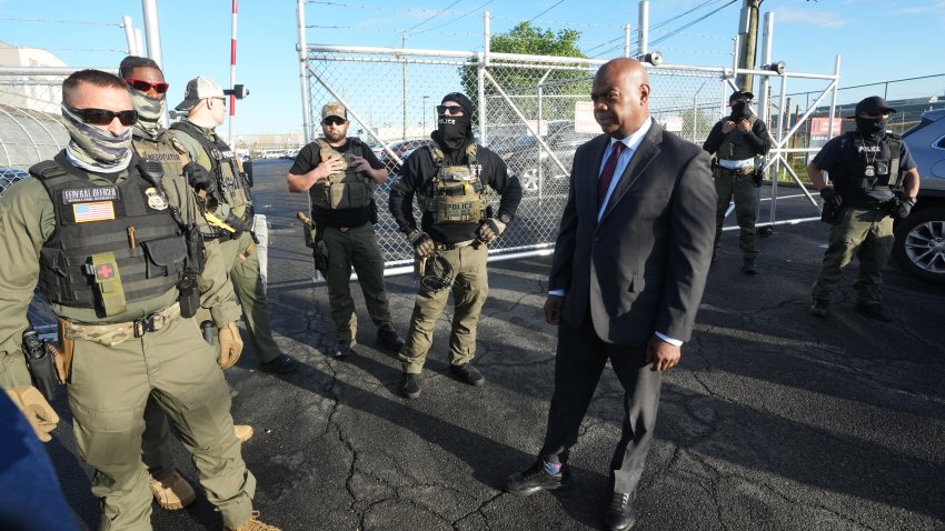 Mayor Ras Baraka of Newark confronts ICE agents at a demonstration outside an immigrant detention centre in Elizabeth, New Jersey May 7, 2025. The Mayor arrived at the gates of Delaney Hall to inspect the previously vacant prison that is being converted into an immigrant detention center. Delaney Hall has the ability to hold over a 1000 people, and the detention facility, privately owned by The GEO Group, holds a contract with the federal government to house people arrested by ICE. (Photo by TIMOTHY A. CLARY / AFP) (Photo by TIMOTHY A. CLARY/AFP via Getty Images)