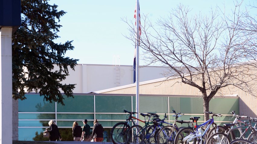 LITTLETON, CO – DECEMBER 13: People walk into Columbine High School after the campus was declared safe on December 13, 2018 in Littleton, Colorado. Three Jefferson county schools were put on lockout after a caller said he was outside the school with a rifle and that there were multiple explosive devices inside the school. Officials declared the threat was false and the area was cleared. Students will remain locked inside the schools until the end of the school day. (Photo by Helen H. Richardson/The Denver Post via Getty Images)