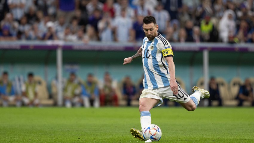 LUSAIL CITY, QATAR – DECEMBER 09:: Lionel Messi of Argentina takes a free kick during the FIFA World Cup Qatar 2022 quarter final match between Netherlands (2) and Argentina (2) (Argentina win 4-3 on penalties) at Lusail Stadium on December 09, 2022 in Lusail City, Qatar. (Photo by Simon Bruty/Anychance/Getty Images)